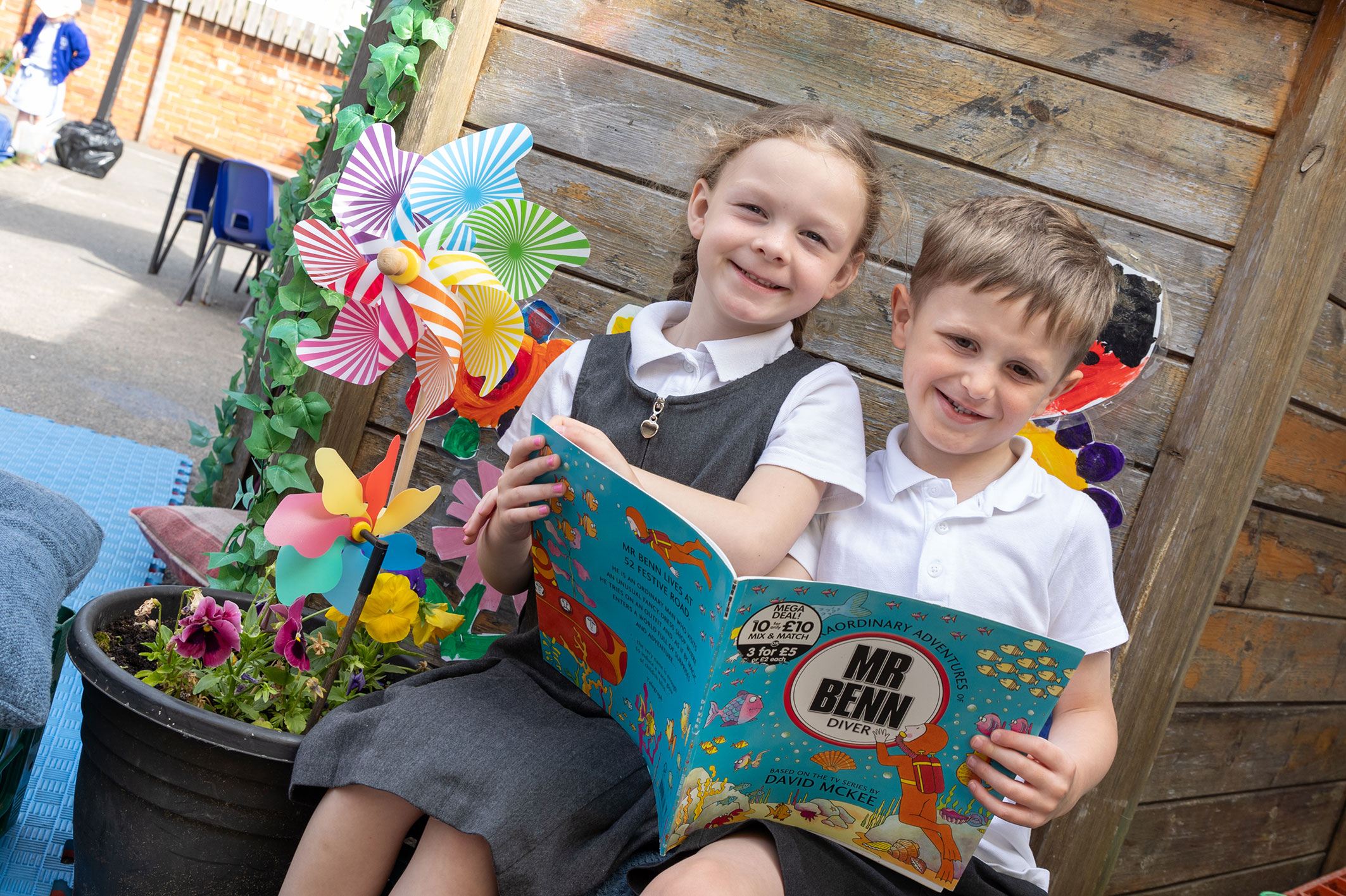 children reading in reception